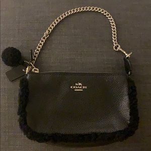 All black Coach purse
